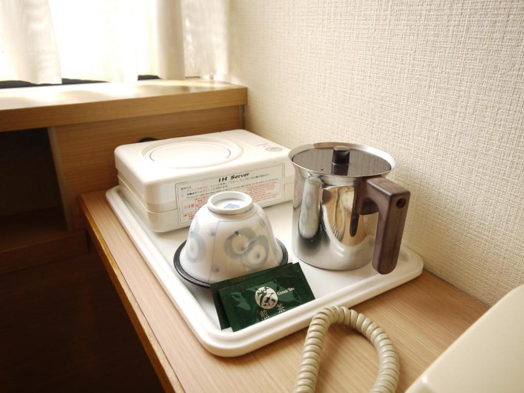 Route-inn Eki Higashi Hotel